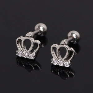 Macro detail of silver crown stud earrings with white zircon stones and screw ball back