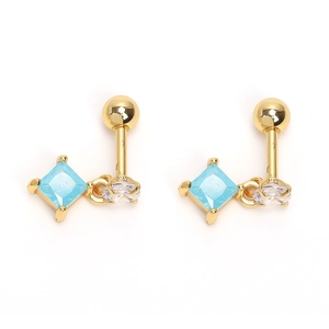 Detailed close-up of golden diamond-shaped blue sapphire stud earrings in high-grade stainless steel