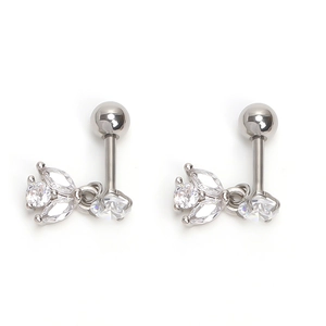 Detail of silver vintage earrings featuring marquise and round zircon floral design