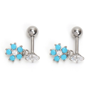 Detailed close-up of stainless steel daisy earrings with blue sapphires and clear zircons