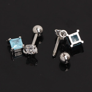 Detail showing blue square zircon and clear round zircon stud earrings with screw backs