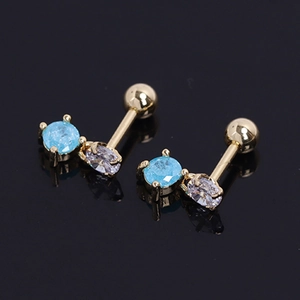 Golden stainless steel cartilage studs featuring round blue stone and white zircon accents