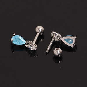 Surgical steel stud earrings featuring sky blue teardrop stone and round clear crystal