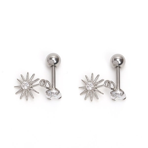 Detailed view of silver octagonal star earrings with zircon inlay and ball studs