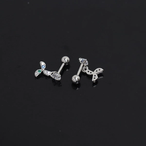 Detail of silver windmill stud earrings with blue green crystals and screw ball back