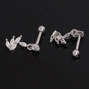 Silver flower stud earrings with marquise cubic zirconia stones and screw back closure