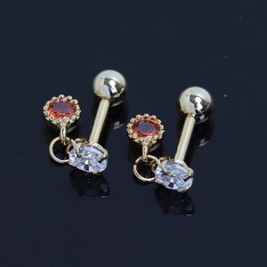 Boucles d'oreilles en acier doré avec pendentifs en zircone orange et transparente