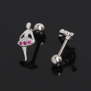 Macro shot of silver ballet girl earrings with pink cubic zirconia and screw ball backs