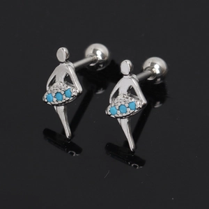 Macro view of silver ballerina stud earrings with light blue gemstone skirt details