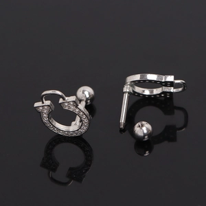 Silver horseshoe earring with pavé-set zircons and threaded screw back closure