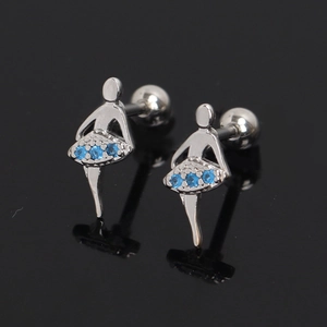 Detailed macro view of silver ballet girl stud earrings with blue crystals and screw backs