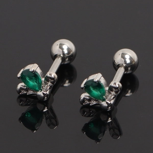 Macro view of silver water-drop green crystal stud earring with leaf detail and screw back