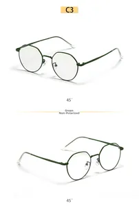 Dual-angle view of vintage round dark green metal frame glasses with transparent lenses