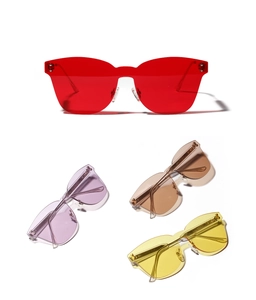 Detailed view of frameless sunglasses featuring gradient purple and ocean blue lenses
