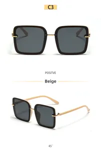 Lunettes de soleil carrées oversize noires et beige avec charnières dorées