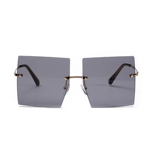 Stylish oversized rimless square sunglasses with grey gradient lenses and gold studs