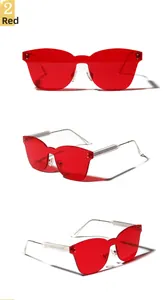 Detailed views of red rimless sunglasses with silver metal temples and one-piece lenses