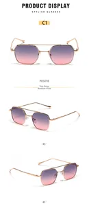 Détails des lunettes de soleil dorées à double pont avec verres dégradés gris-rose