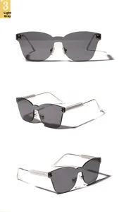 Three-view shot of light grey rimless shield sunglasses with minimalist metal temples