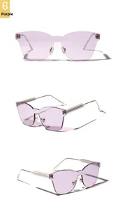 Detail view of purple rimless oversized sunglasses with thin metal temples from multiple angles