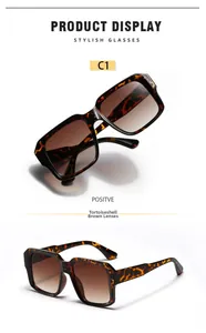 Detail view of square tortoiseshell sunglasses with brown gradient lenses for men and women