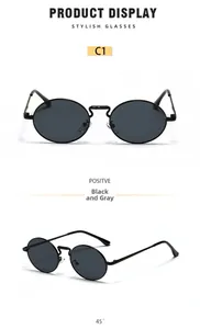 Front and 45-degree angle views of retro oval metal sunglasses with gray lenses