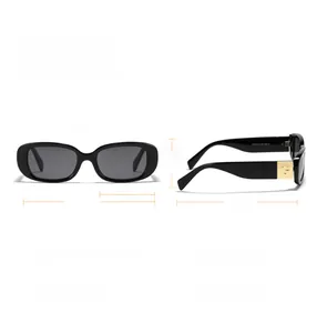 Detail of retro narrow square sunglasses featuring gold-tone G hardware on black temples