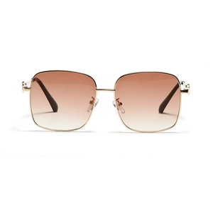 Fashionable oversized square metal sunglasses with golden frame and brown gradient lenses