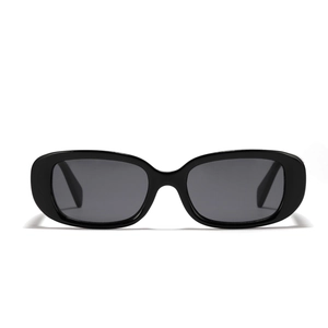 Retro black thick frame square sunglasses with dark lenses in a minimalist fashion style