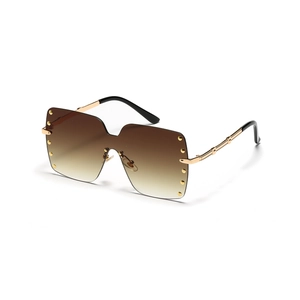 Oversized rimless square sunglasses with gradient brown lenses and gold rivet details