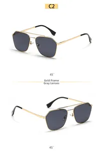 Detail of square pilot sunglasses with gold metal frame and double bridge structure