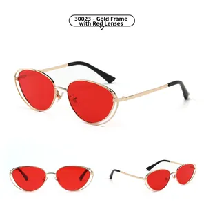 Detailed three-view shot of retro punk gold metal cat eye sunglasses with red lenses