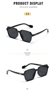 Detailed 45-degree angle of square oversized sunglasses with black frames and grey lenses