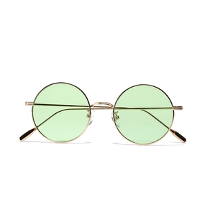 Lunettes de soleil rondes rétro avec verres vert clair et monture en métal doré