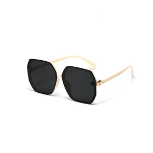 Oversized geometric hexagonal sunglasses with cream frames and black lenses for women and men