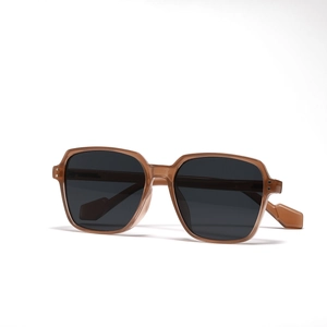Fashionable square frame sunglasses in translucent brown with dark UV lenses for women