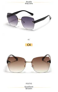 Detail view of square rimless sunglasses in gradient grey and brown diamond cut lenses
