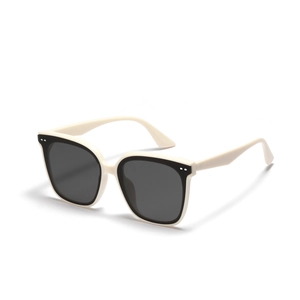 Modern beige square sunglasses with dark lenses and metallic rivets in a 45-degree view