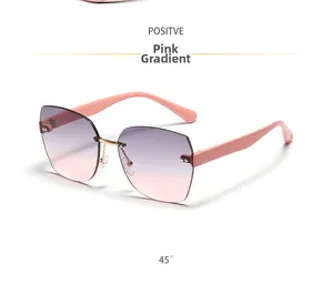 Detail of grey-pink gradient rimless sunglasses with 45-degree angle product view