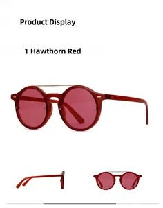 Detail view of hawthorn red round sunglasses with vintage gold double bridge design