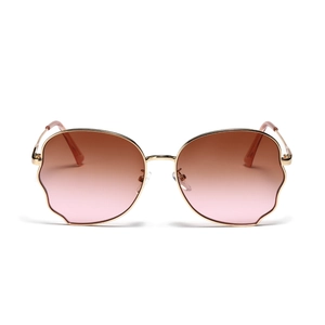 Fashion butterfly oversized sunglasses with gradient lenses and gold metal frame on white