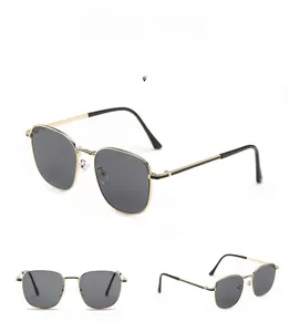 Macro display of retro square sunglasses with gold metal frame and grey lenses S3023