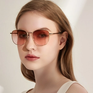 Stylish square oversized sunglasses with gold metal frame and pink gradient lenses
