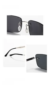 Close-up of metal hinges, silicone nose pads and engraved temple on Y2033 sunglasses