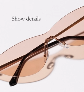 Detail of A1171 frameless sunglasses with gold metal bridge and clear brown lenses