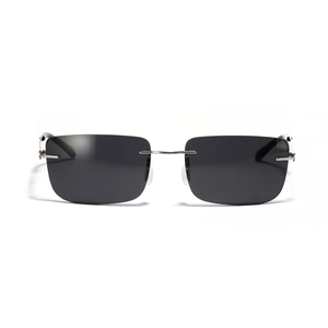 Futuristic rimless square sunglasses with grey lenses and silver metal temples for women