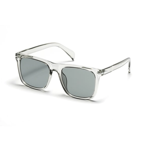 Modern square oversized sunglasses with transparent frames and gray lenses in side view