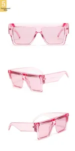 Detailed views of transparent pink oversized rectangular sunglasses with resin frames