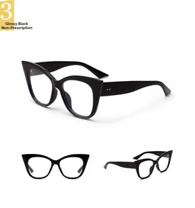 Details einer übergroßen schwarzen Cat-Eye-Brille mit Metallnieten und glänzendem Finish