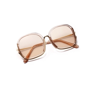 Fashionable oversized semi-rimless sunglasses with brown lenses and gold metal temples